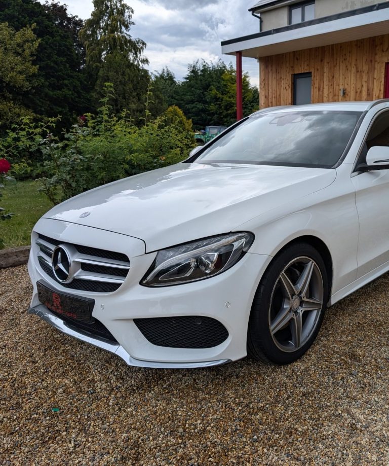 A white Mercedes C-Class